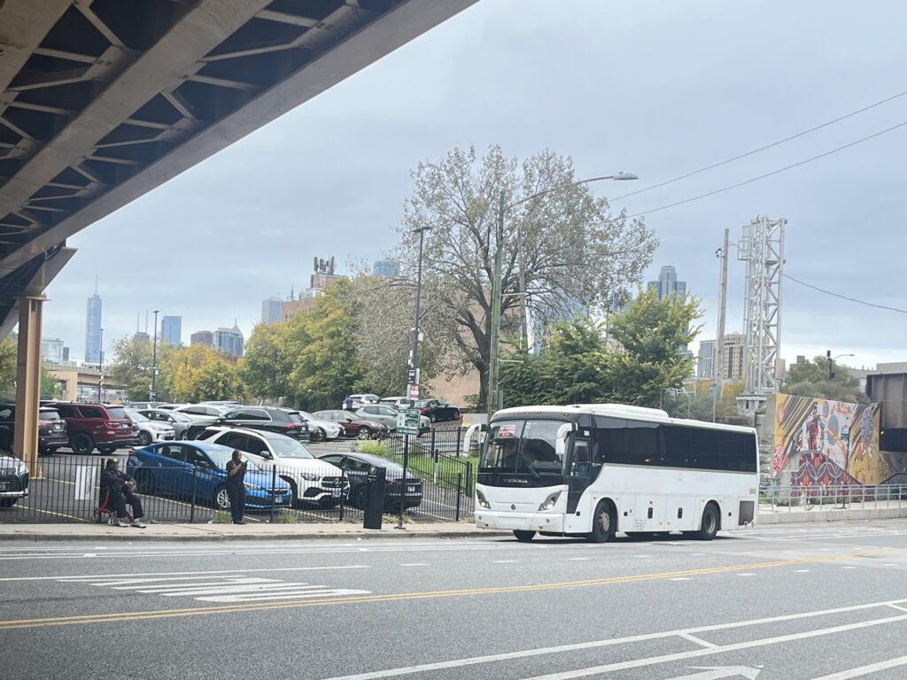 Archer Ave, northside of the street across the from entrance to the CTA Red Line Cermak Station Coach at the shuttle pickup on the north side of Archer Avenue, across from the CTA Red Line station entrance at Cermak.